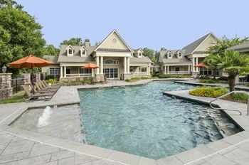 Breezy resort-style pool, relaxing hot tub, and wading pool